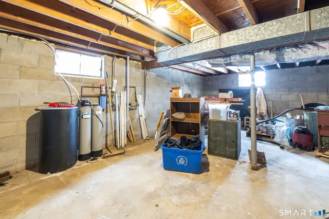 a view of parking garage with cars