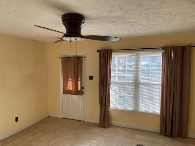 a view of entryway with a front door