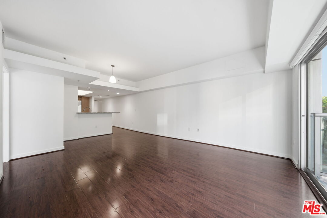 13700 Marina Pointe Drive, Unit 318 Marina del Rey, CA 90292 - Photo 14 of 75 a view of empty room with wooden floor