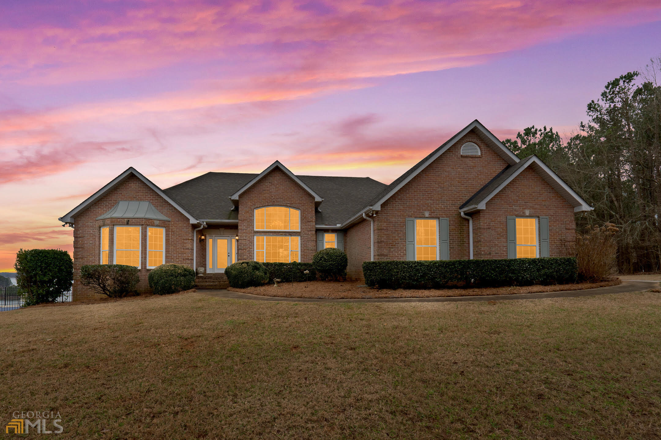 1005 Moccasin Gap Road Locust Grove, GA 30248 - Photo 1 of 1 a front view of a house with a yard