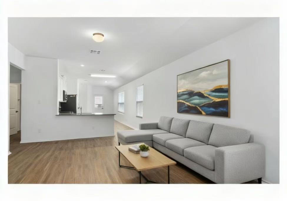 108 Joe Kidd Lane Jarrell, TX 76537 - Photo 1 of 22 a living room with furniture and a wooden floor