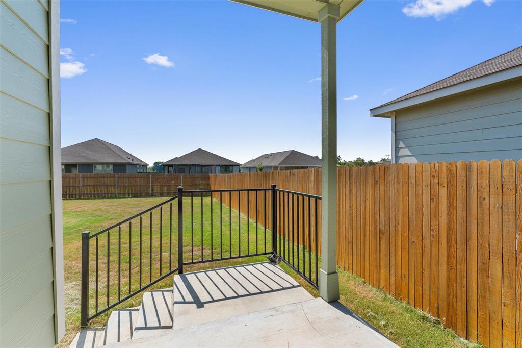 108 Joe Kidd Lane Jarrell, TX 76537 - Photo 18 of 22 a view of balcony with wooden floor