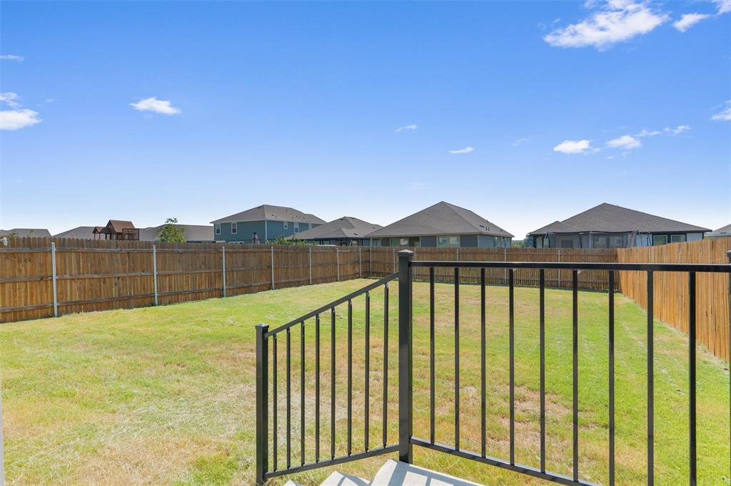 108 Joe Kidd Lane Jarrell, TX 76537 - Photo 19 of 22 a view of swimming pool with wooden fence