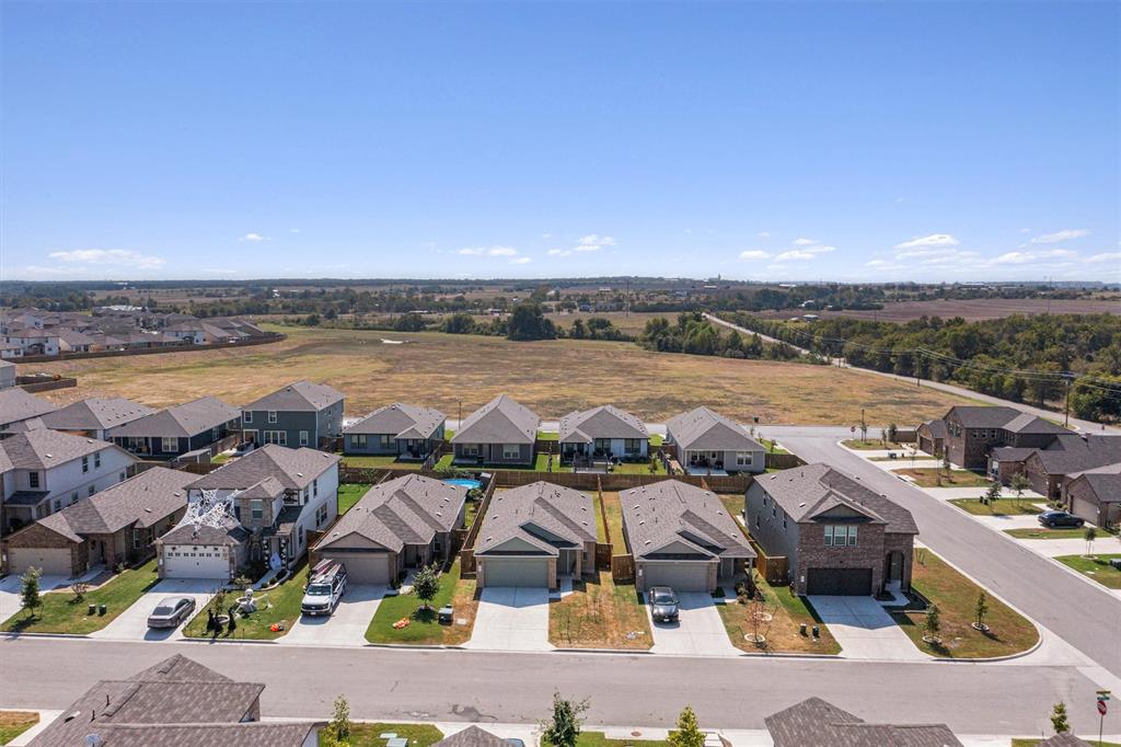 108 Joe Kidd Lane Jarrell, TX 76537 - Photo 22 of 22 an aerial view of residential building and lake view