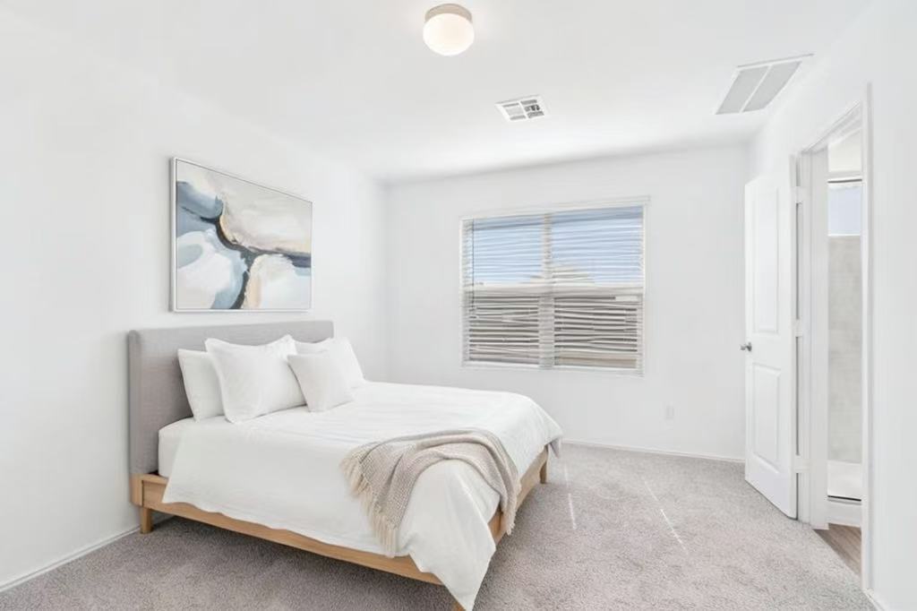 108 Joe Kidd Lane Jarrell, TX 76537 - Photo 9 of 22 a bedroom with a bed and a window