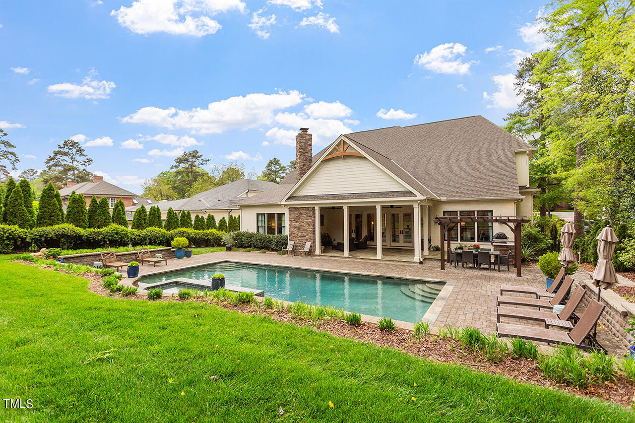 2311 Churchill Road Raleigh, NC 27608 - Photo 23 of 73 a front view of a house with garden