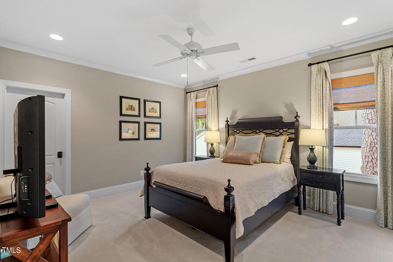 2311 Churchill Road Raleigh, NC 27608 - Photo 53 of 73 a bedroom with a bed and a window