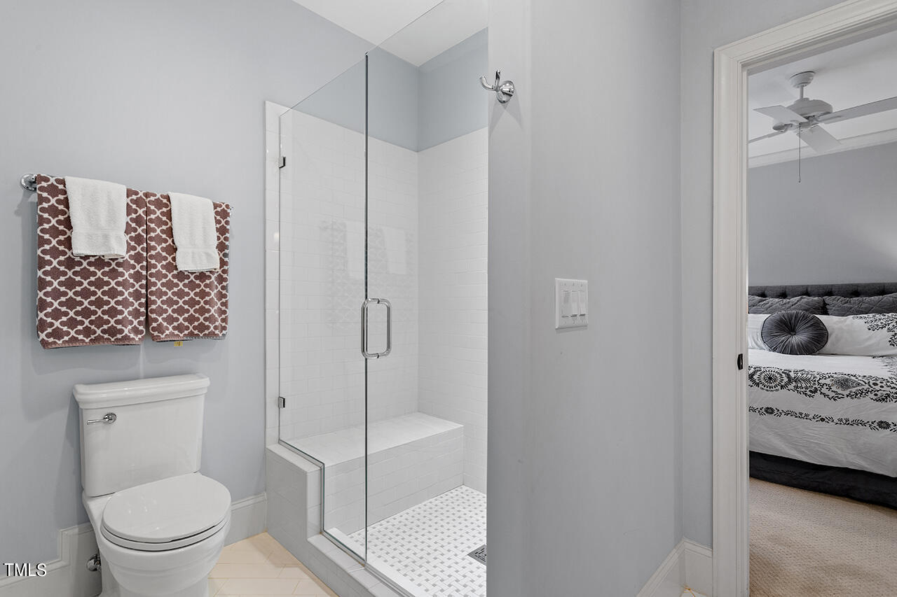 2311 Churchill Road Raleigh, NC 27608 - Photo 56 of 73 a bathroom with a toilet and a shower