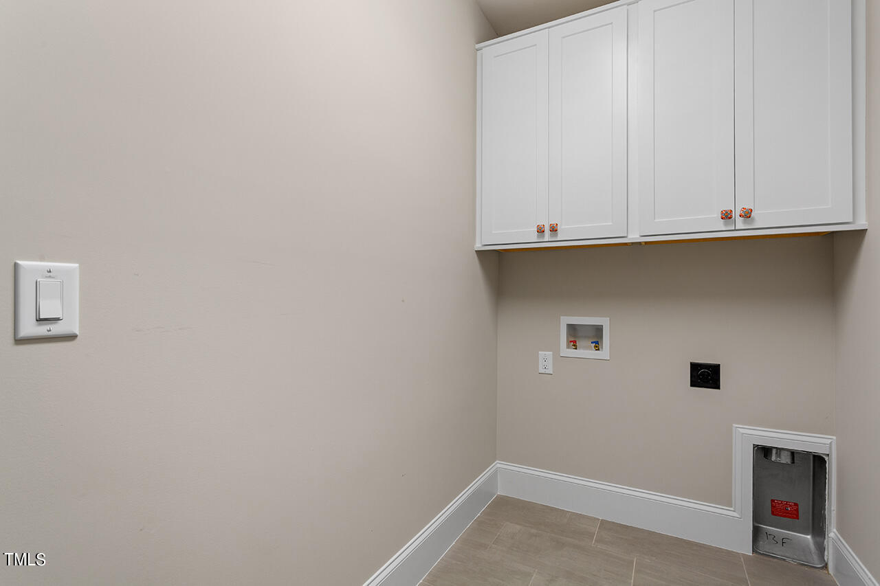 2311 Churchill Road Raleigh, NC 27608 - Photo 60 of 73 Laundry Room- Upper Floor