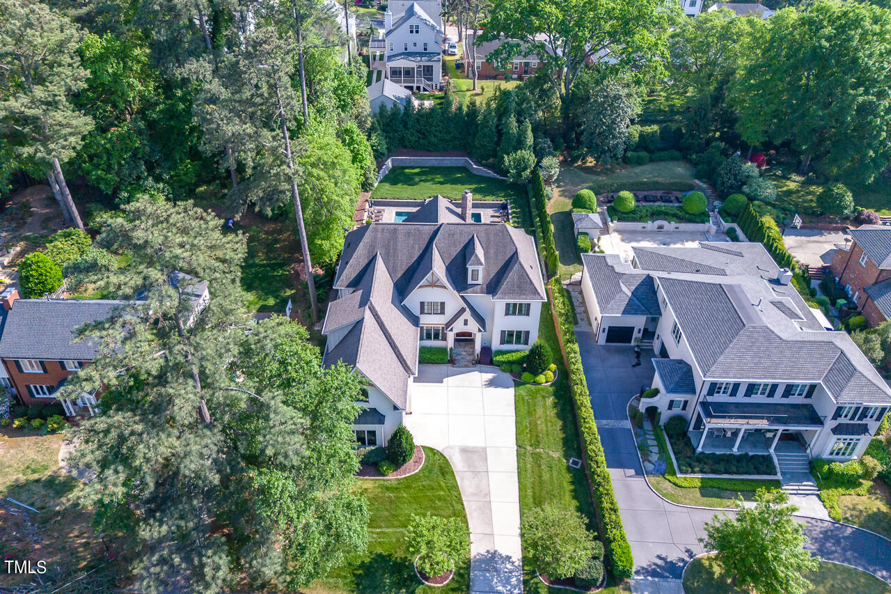 2311 Churchill Road Raleigh, NC 27608 - Photo 63 of 73 an aerial view of a house with a garden and plants