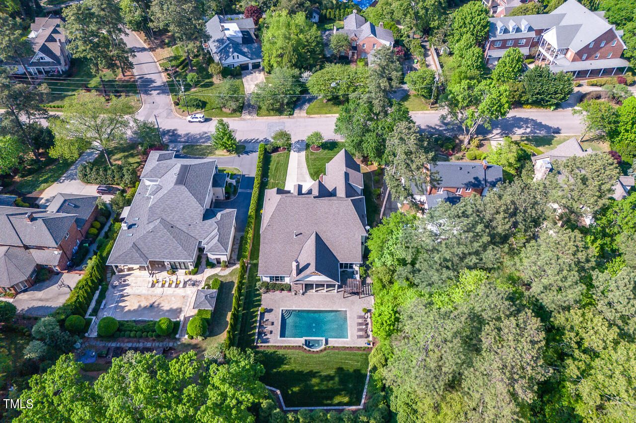 2311 Churchill Road Raleigh, NC 27608 - Photo 66 of 73 an aerial view of multiple houses with yard