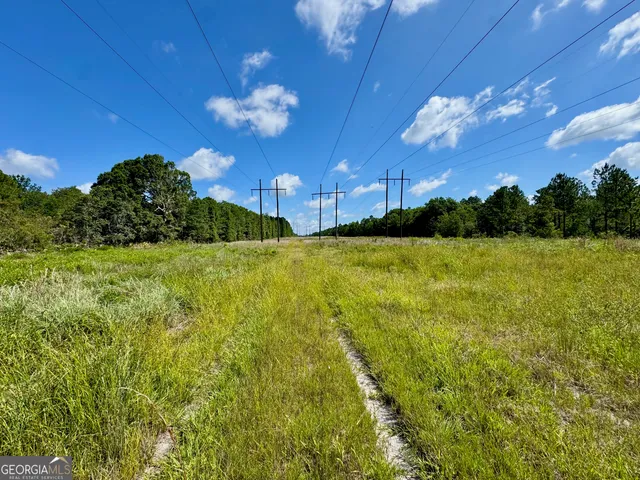 a view of a building with a big yard