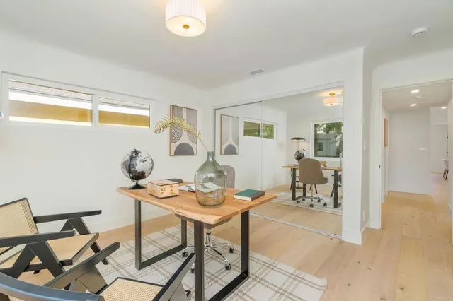 a workspace with furniture and a table