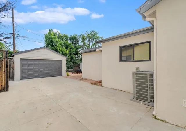 a view of outdoor space and front view of a house