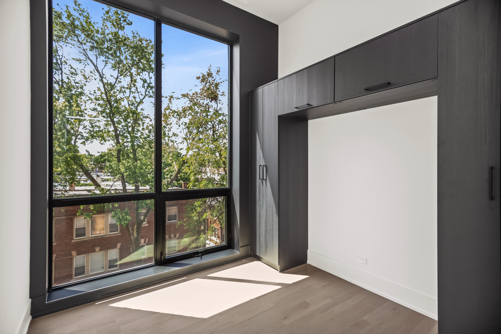 6556 South Minerva Avenue, Unit 2S Chicago, IL 60637 - Photo 11 of 19 a view of a glass door with a outdoor space