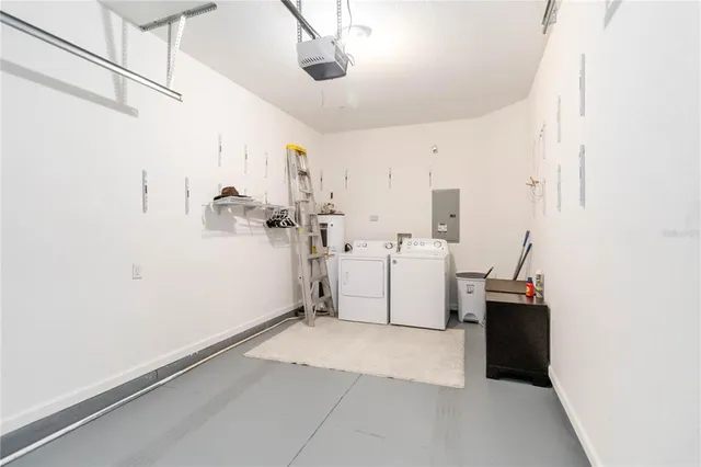 a view of a storage & utility room with a sink