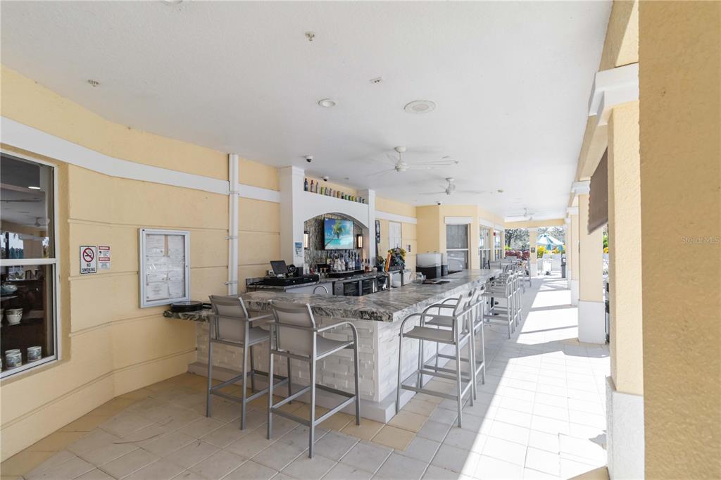 5038 Tideview Circle, Unit 26 Orlando, FL 32819 - Photo 26 of 42 a view of a dining room kitchen and a window