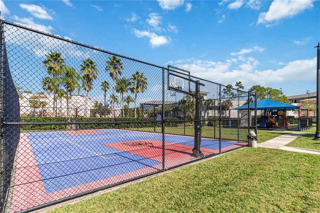 5038 Tideview Circle, Unit 26 Orlando, FL 32819 - Photo 27 of 42 a view of a swimming pool with an outdoor space and seating area