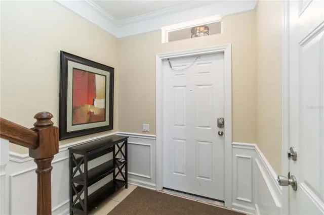 a view of front door with a hallway