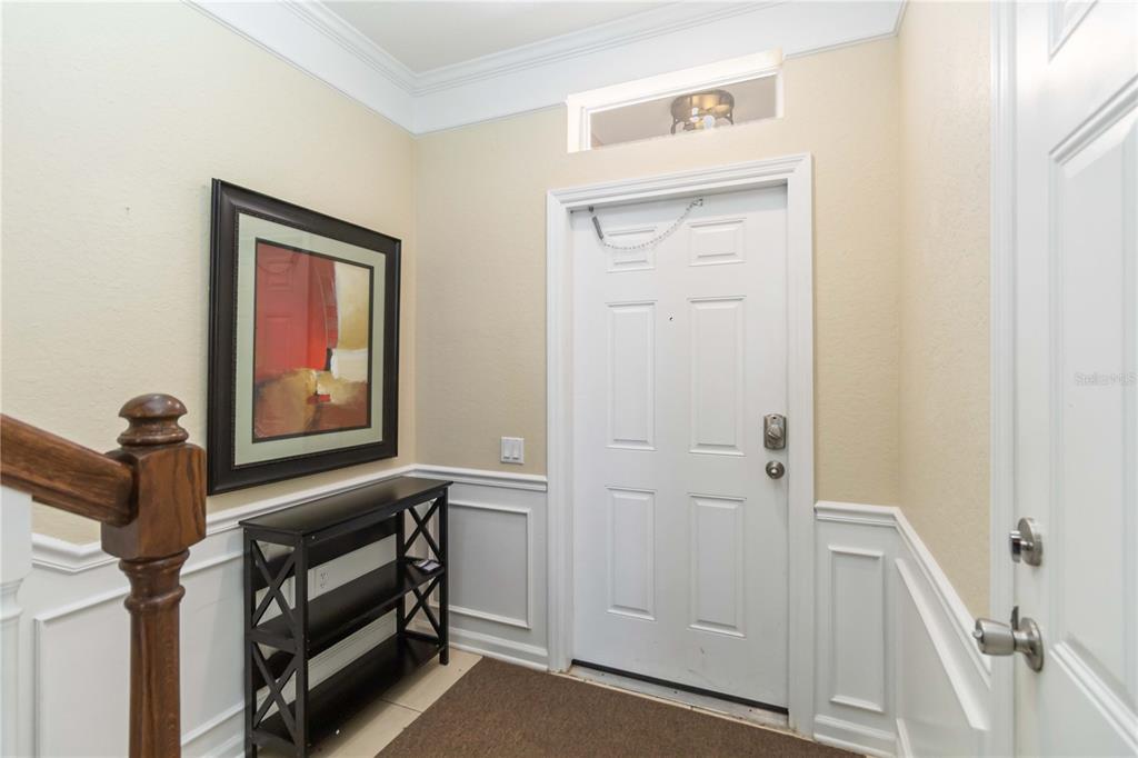 5038 Tideview Circle, Unit 26 Orlando, FL 32819 - Photo 3 of 42 a view of front door with a hallway