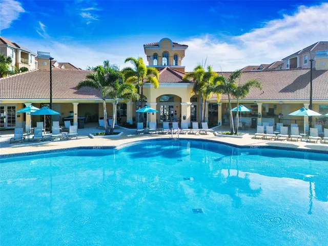 a view of a building with a swimming pool