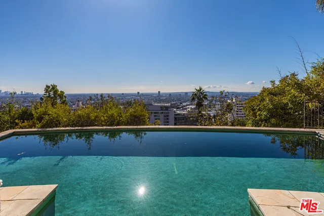 a view of a house with a garden