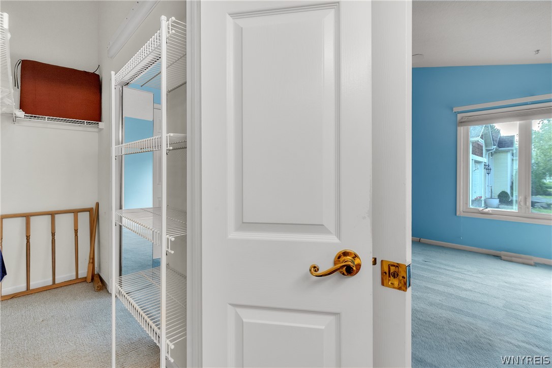 1679 Maple Road, Unit D Amherst, NY 14221 - Photo 21 of 36 Linen Closet and primary closet have access from t