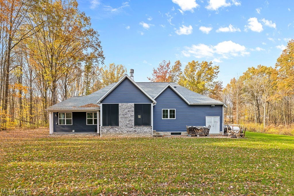 9340 Yale Road Diamond, OH 44412 - Photo 45 of 50 Rear view of house with a beautiful yard and access to the basement and shooting range