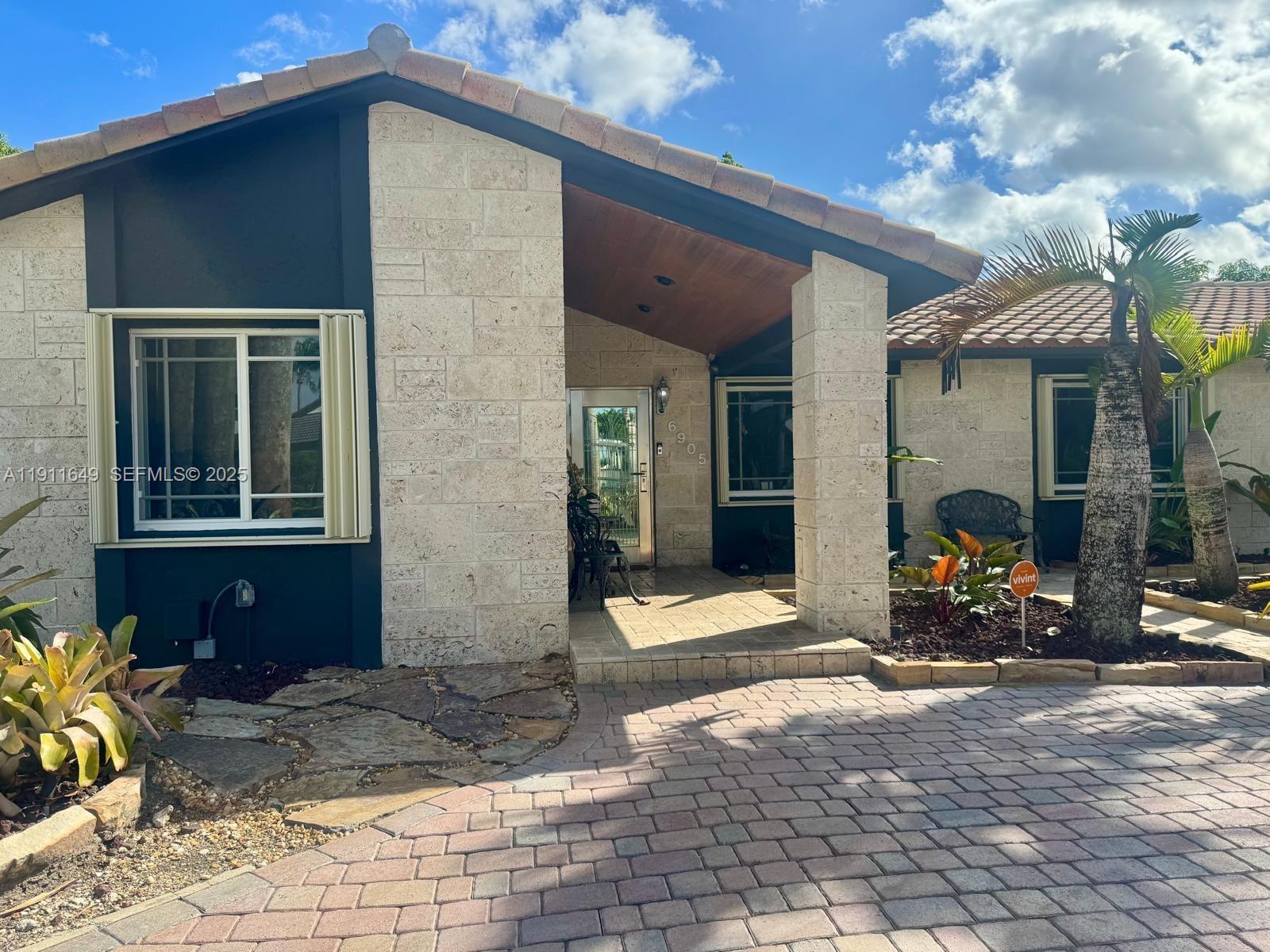 6905 Southwest 148th Court Miami, FL 33193 - Photo 1 of 26 a view of a house with outdoor space
