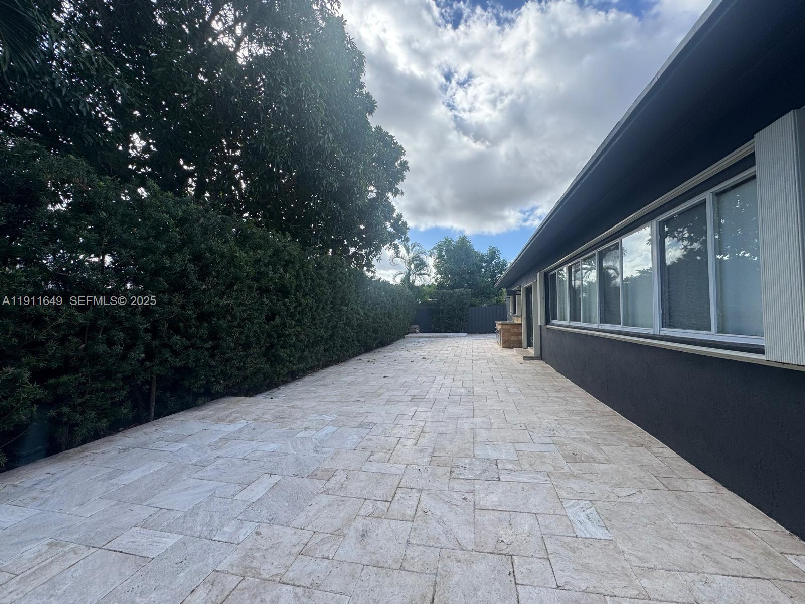 6905 Southwest 148th Court Miami, FL 33193 - Photo 11 of 26 a view of an empty room with a fireplace