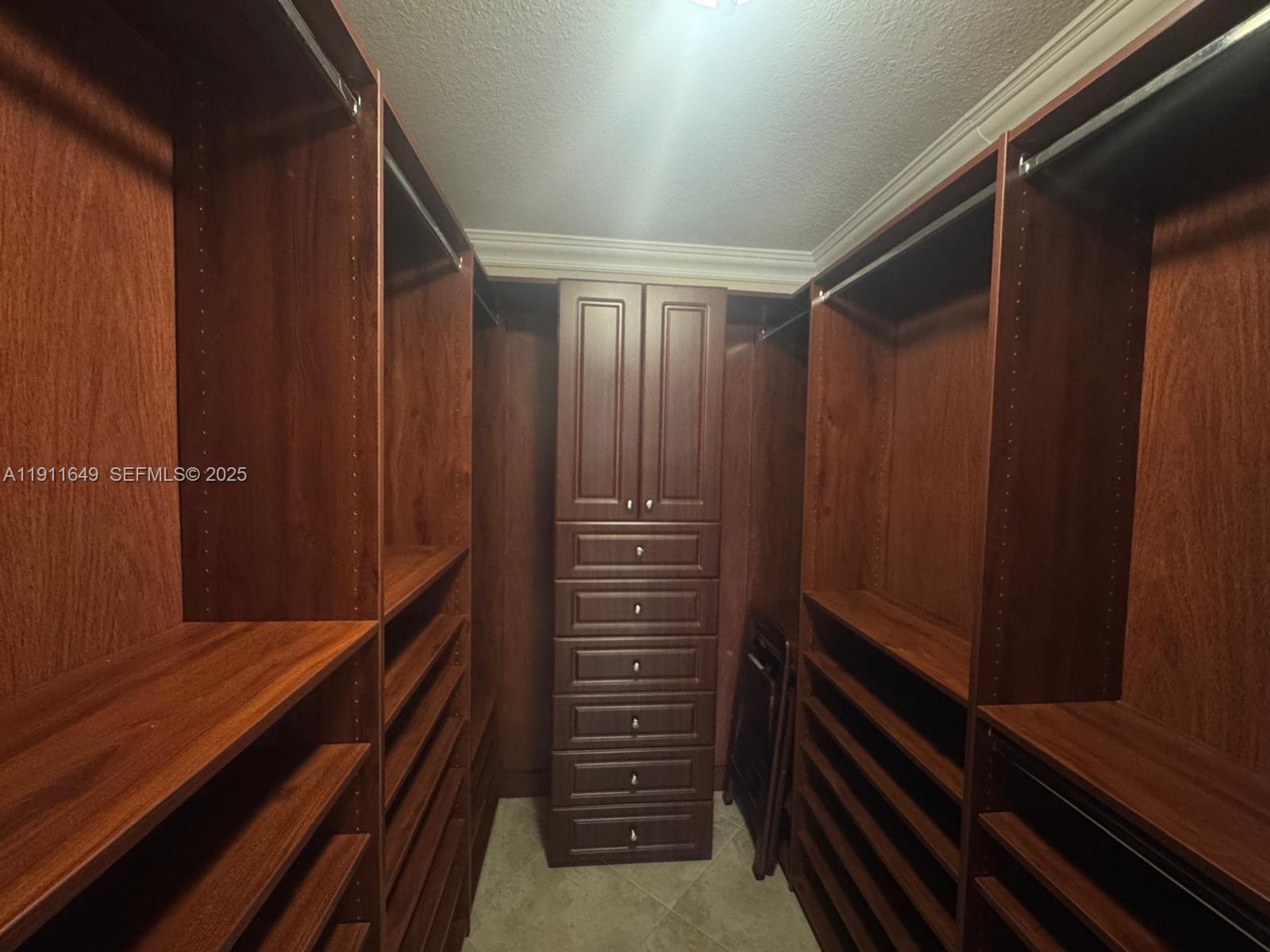 6905 Southwest 148th Court Miami, FL 33193 - Photo 16 of 26 a view of walk in closet