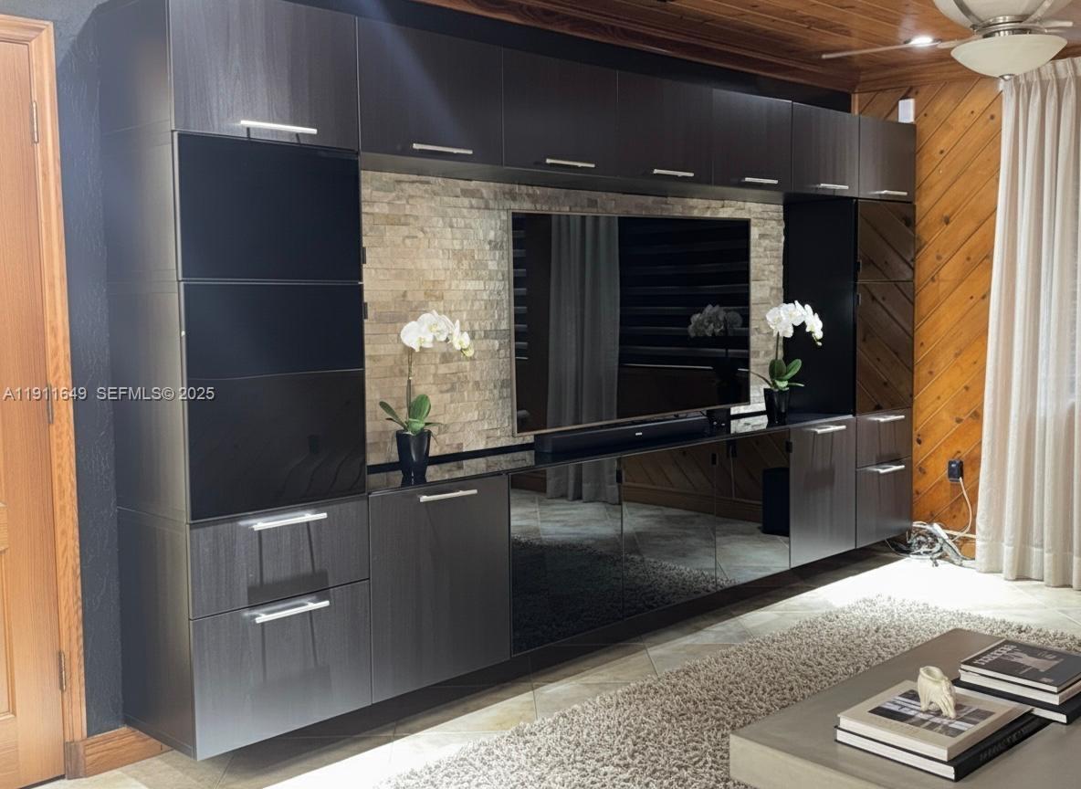 6905 Southwest 148th Court Miami, FL 33193 - Photo 21 of 26 a view of a hallway with some couch