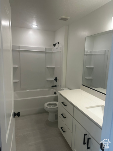80 South Moonlit Road Mapleton, UT 84664 - Photo 14 of 18 Bathroom featuring shower / washtub combination, vanity, and light tile patterned flooring