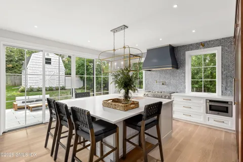 a dining room with a table or chairs and a wooden floor