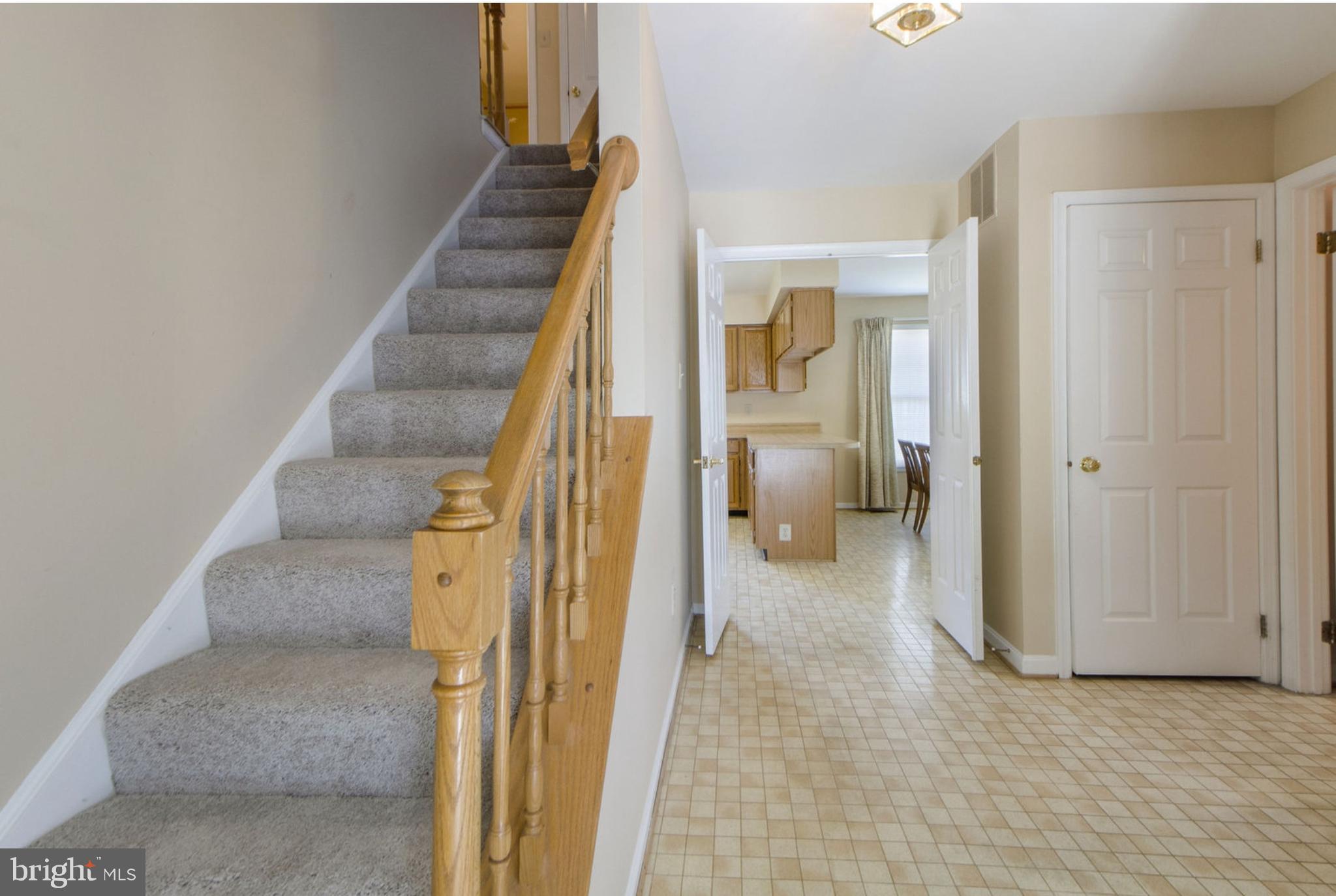1933 Autumn Ridge Circle Silver Spring, MD 20906 - Photo 15 of 28 Foyer & Stairs to Upper Level