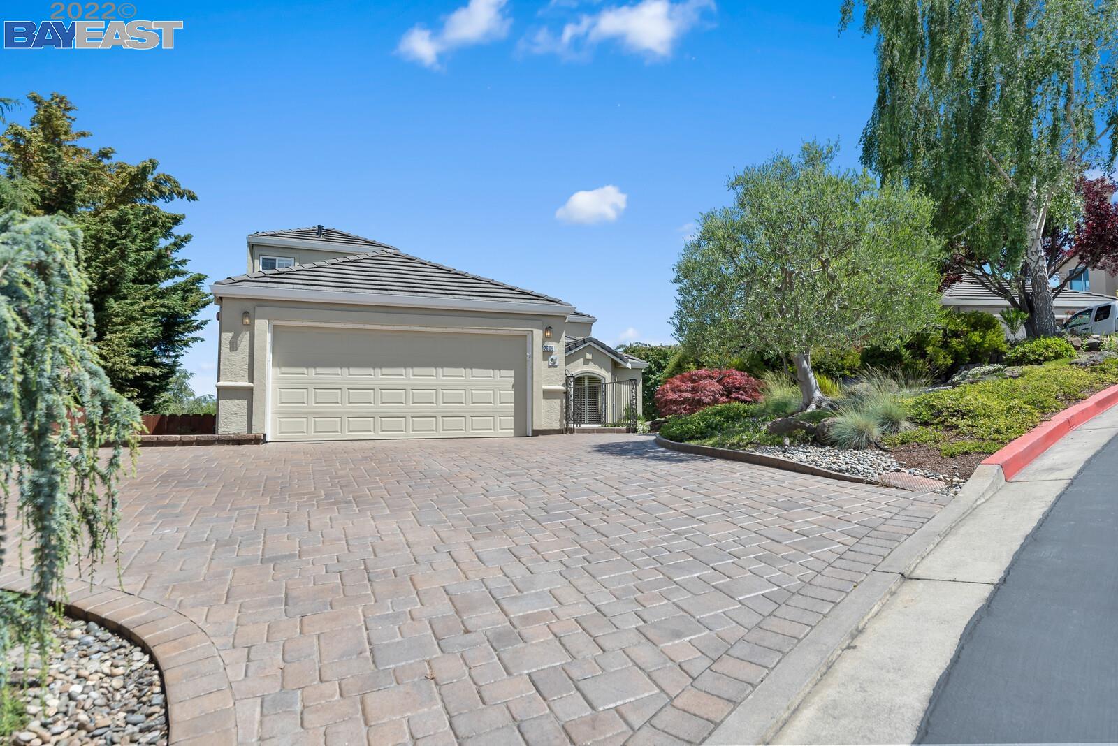 2609 Fox Ridge Drive Castro Valley, CA 94546 - Photo 1 of 1 a front view of a house with a yard and garage