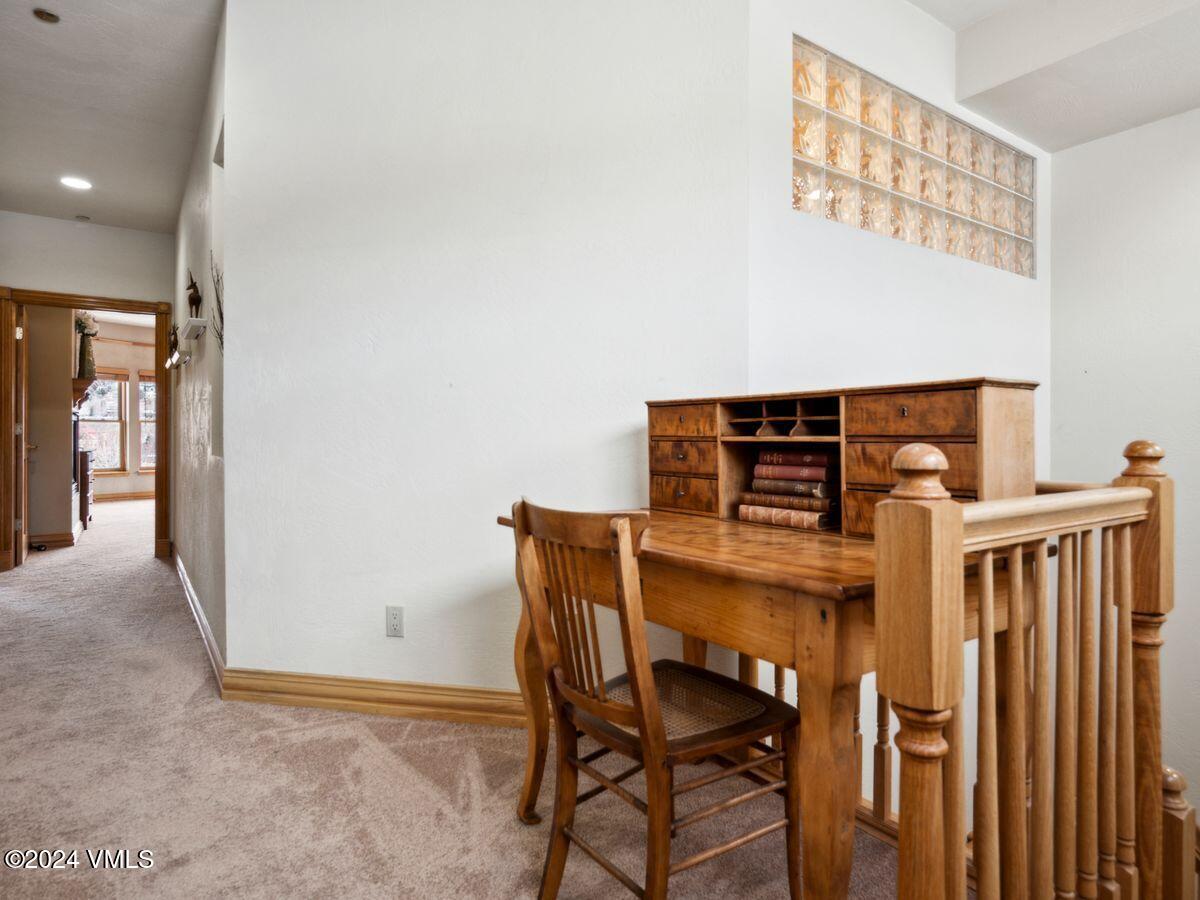 137 Main Street, Unit R203 Edwards, CO 81632 - Photo 24 of 39 a view of a room with table and chairs