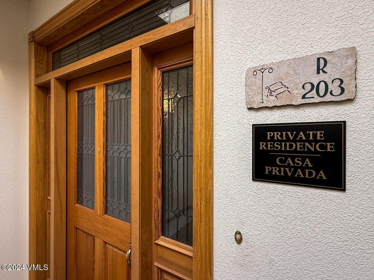 137 Main Street, Unit R203 Edwards, CO 81632 - Photo 33 of 39 a sign on a door