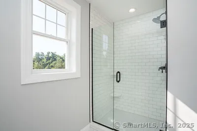 a bathroom with a sink a toilet and a bathtub