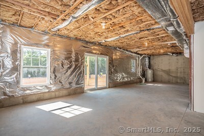 953 High Road Berlin, CT 06037 - Photo 27 of 32 a view of an empty room with a window