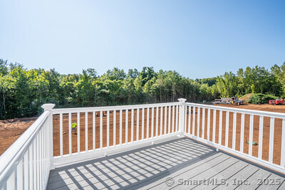 953 High Road Berlin, CT 06037 - Photo 28 of 32 a balcony with wooden floor and fence