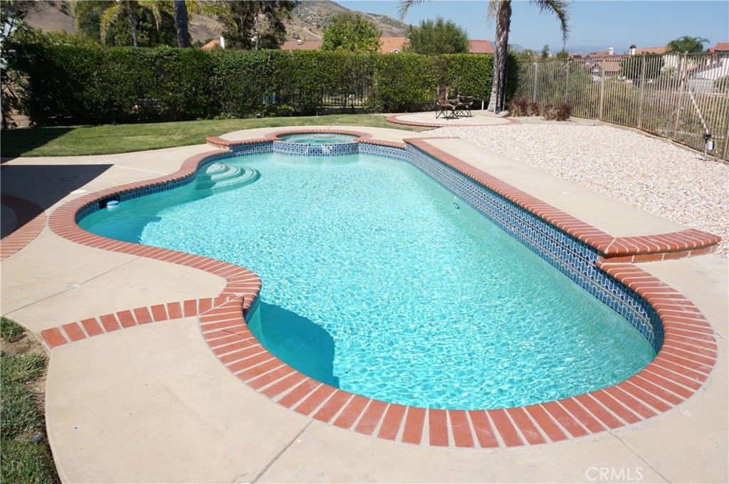 19584 Shadow Glen Circle Porter Ranch, CA 91326 - Photo 44 of 72 a view of swimming pool with a garden