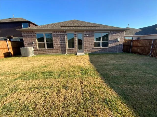 a house view with a backyard space