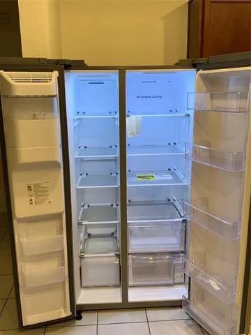 a view of swimming pool with seating space