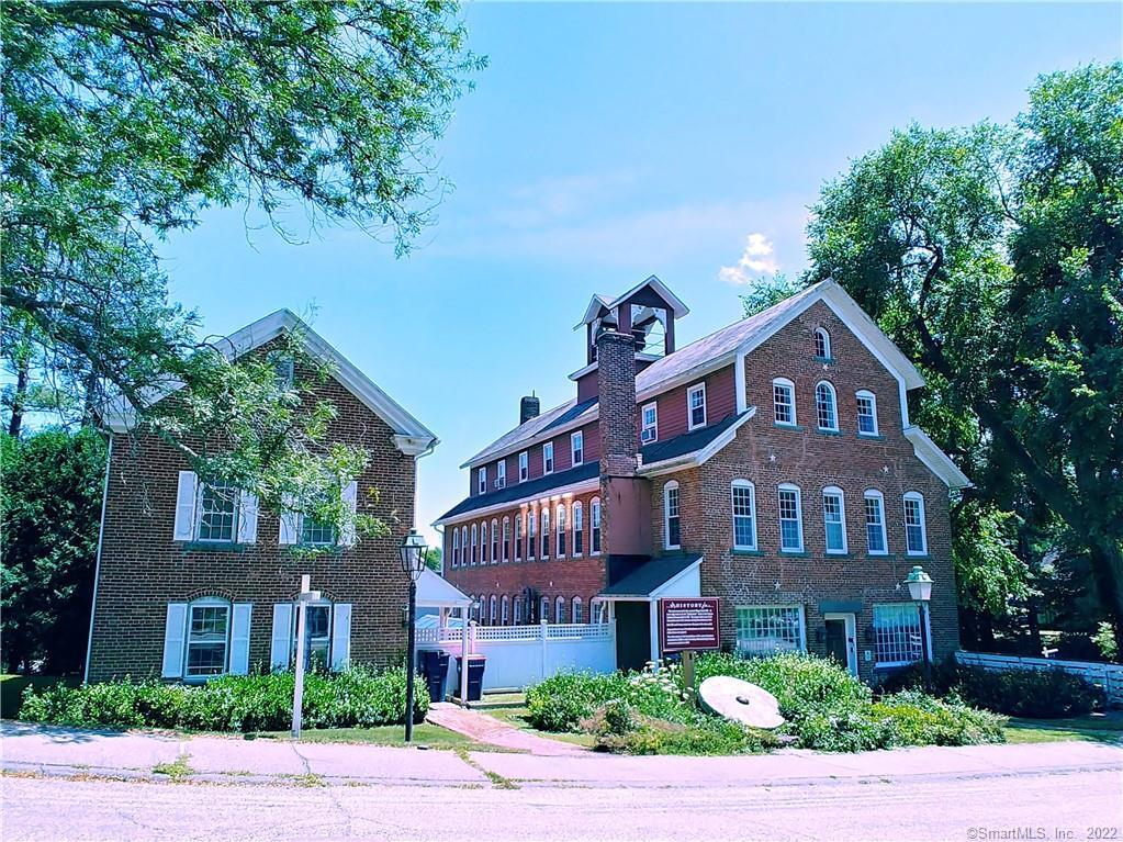 8 Holley Street Salisbury, CT 06039 - Photo 1 of 21 a front view of a house with a yard and potted plants