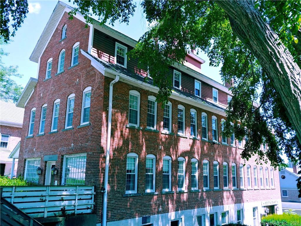 8 Holley Street Salisbury, CT 06039 - Photo 2 of 21 a front view of a multi story residential apartment buildings