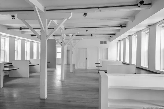 a spacious bathroom with a tub and shower