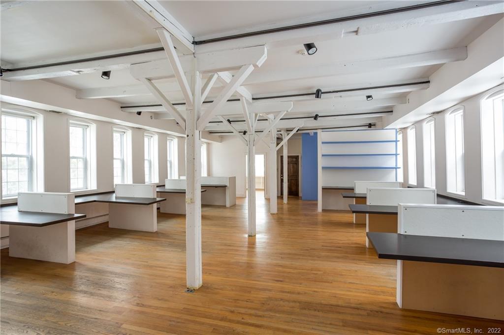 8 Holley Street Salisbury, CT 06039 - Photo 8 of 21 a large room with lots of furniture and wooden floor