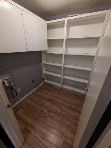 a room with storage and utility