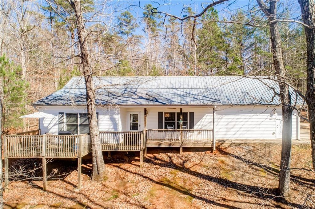 2380 Grandview Road Jasper, GA 30143 - Photo 1 of 1 a view of a house with a bench in balcony